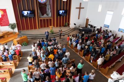 Worshiping together in weekly chapel